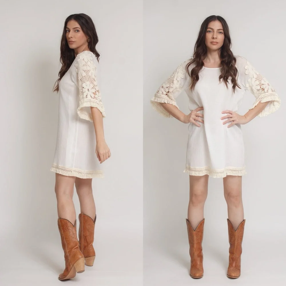 Umgee
Mini dress with floral crochet sleeves and fringe detail size S Small NWT - Picture 2 of 13
